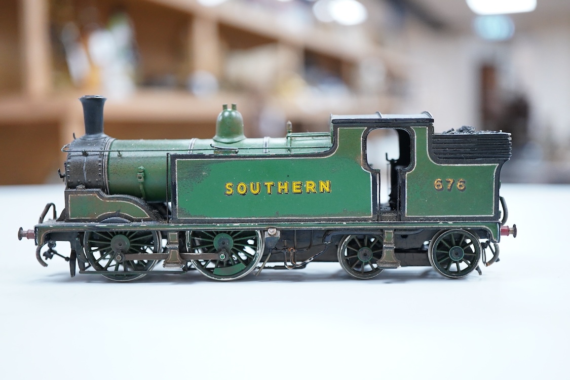 An EM gauge scratch built model railway locomotive by John Worsley, a Southern Railway Drummond M7 0-4-4T, 676, a detailed model with opening smoke box door showing the details of the blast pipe and boiler tube ends, spr